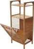 A wooden shelf unit with a laundry basket compartment. Podgląd zdjęcia produktu