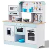 A wooden toy kitchen playset with various accessories. Produktbild-Vorschau