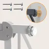 Close-up view of a baby gate installation component and hardware. Voir les images du produit
