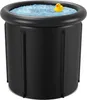 A black inflatable ice bath with a yellow rubber duck floating in the water. Produktbild-Vorschau