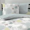 A close-up view of bedding with a forest and deer pattern. Produktbild-Vorschau