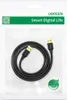 The product is shown in its retail packaging, which is a clear plastic bag with a printed cardboard header. A black USB cable is coiled inside the packaging. Anteprima dell’immagine prodotto