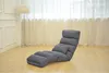 A gray chaise lounge chair is shown in a room with light-colored walls and curtains. Produktbild-Vorschau