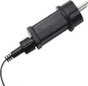 A black electrical plug with a wire attached, shown against a white background. Voir les images du produit