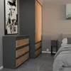 A bedroom scene featuring a chest of drawers and a wardrobe. Produktbild-Vorschau