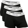 Three black Calvin Klein boxer briefs are stacked on top of each other. Podgląd zdjęcia produktu