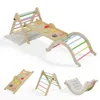 A set of wooden climbing toys for children, including a climbing triangle, arch, slide, and rocker, displayed on a white background. Podgląd zdjęcia produktu