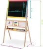 A wooden easel with a blackboard and various educational accessories, with dimensions indicated by measurement lines and text. Voir les images du produit