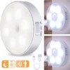 A collage of LED night lights with motion sensors, showing different angles and usage scenarios. Produktbild-Vorschau
