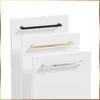 Three cabinet handles in different colors (black, gold, and silver) are displayed on white cabinet doors, stacked vertically. Náhled obrázku produktu