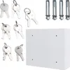 A collection of keys and mounting hardware arranged around a white box. Produktbild-Vorschau