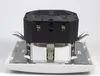 A close-up, angled view of the back of a white electrical outlet with a black housing unit attached, showing internal wiring connections and mounting brackets. Produktbild-Vorschau