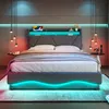 A modern bedroom with a bed featuring LED lighting. Produktbild-Vorschau