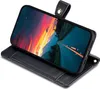 A black leather flip case for a smartphone, shown open with the phone displaying a colorful landscape wallpaper. Produktbild-Vorschau
