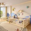 A child's bedroom with a wooden bed frame, toys, and decorative elements.