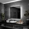 A modern bathroom vanity with a large, illuminated mirror above it. Produktbild-Vorschau