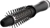 A close-up, studio shot of a black and silver hair styling tool against a white background. Anteprima dell’immagine prodotto