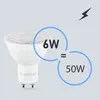 A white LED light bulb is shown next to a graphic comparing its wattage to a traditional halogen bulb. Produktbild-Vorschau
