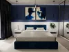 A modern bedroom with a dark blue upholstered bed as the centerpiece. Náhľad obrázku produktu