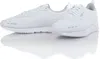 A pair of white Puma sneakers shown from a side-angle with their reflection on a white surface. Anteprima dell’immagine prodotto