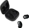 A black charging case for Samsung Galaxy Buds Live is shown open, with two earbuds placed next to it on a white background. Produktbild-Vorschau