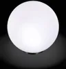 A white sphere with a dark base is shown against a dark background. Produktbild-Vorschau