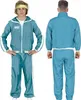 A person wearing a teal tracksuit with white stripes and a yellow headband. Produktbild-Vorschau