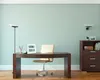 A modern office desk setup with a digital clock, chair, and filing cabinet. Náhled obrázku produktu