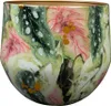 A close-up view of a decorative pot with a botanical print. Voir les images du produit