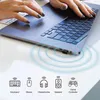 A person's hands are typing on a laptop, with a small black USB Bluetooth adapter plugged into the side. Icons representing various devices are displayed below, connected by radiating lines to the adapter, suggesting wireless connectivity. Voir les images du produit
