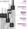 A display of various Claresa base coat nail polish bottles arranged on stacked blocks, with accompanying text and color swatches indicating product names and densities. Náhled obrázku produktu