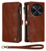 A brown leather wallet-style phone case with a zipper and a wrist strap is shown. Produktbild-Vorschau
