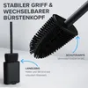 A black toilet brush and its holder are shown, with text highlighting features. Produktbild-Vorschau