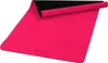 A pink yoga mat is partially unrolled on a white background. Náhled obrázku produktu