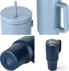 A collage of four close-up images of insulated tumblers in different colors and orientations. Produktbild-Vorschau
