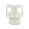 A studio shot of a beige armchair. Anteprima dell’immagine prodotto