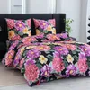 A bed with floral bedding. Produktbild-Vorschau