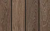 A close-up view of a wooden surface, likely decking or siding, showing the grain and texture of the material. Produktbild-Vorschau