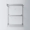A wall-mounted drying rack with multiple shelves against a white wall. Anteprima dell’immagine prodotto