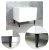 A white cabinet with black legs is shown, with close-up insets of the legs. Produktbild-Vorschau