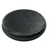 A black manhole cover with a textured surface, shown from a slightly elevated angle against a white background. Podgląd zdjęcia produktu