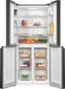 An open refrigerator with food items on the shelves. Produktbild-Vorschau