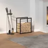 A fireplace set and firewood rack in a room. Náhľad obrázku produktu