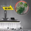 A steam mop head is shown emitting steam onto a surface with illustrations of germs and mites, while a magnified view shows chopped green herbs being sterilized. Náhled obrázku produktu