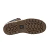 The sole of a brown boot is shown against a white background. Voir les images du produit