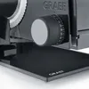 A close-up shot of a black Graef food slicer, focusing on the dial and blade. Anteprima dell’immagine prodotto