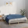 A bedroom scene with a bed, bedding, and artwork on the wall. Produktbild-Vorschau