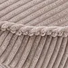 A close-up view of beige corduroy fabric, showing the texture and ribbed pattern. Anteprima dell’immagine prodotto