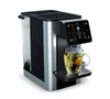 A close-up shot of a water dispenser/tea maker with a cup of tea being dispensed. Produktbild-Vorschau