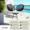 A patio set with two chairs and a table on a tiled surface next to a pool with a tropical background. Produktbild-Vorschau